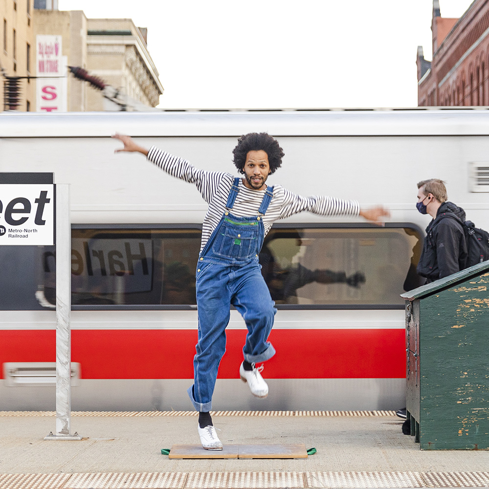 Leonardo Sandoval, jumping and tap dancing on a MetroNorth train platform.